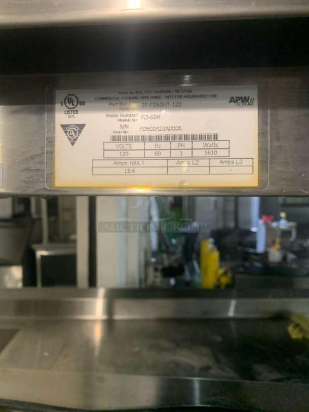 APW Wyott FD-60H overhead food warmer, 120V, label detailing model, voltage, and certification visible, excellent condition.