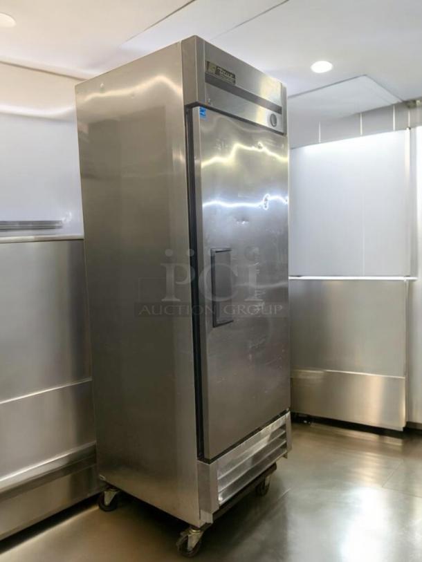 TRUE commercial upright freezer, single door, in superior condition. 115V, fully tested and working.