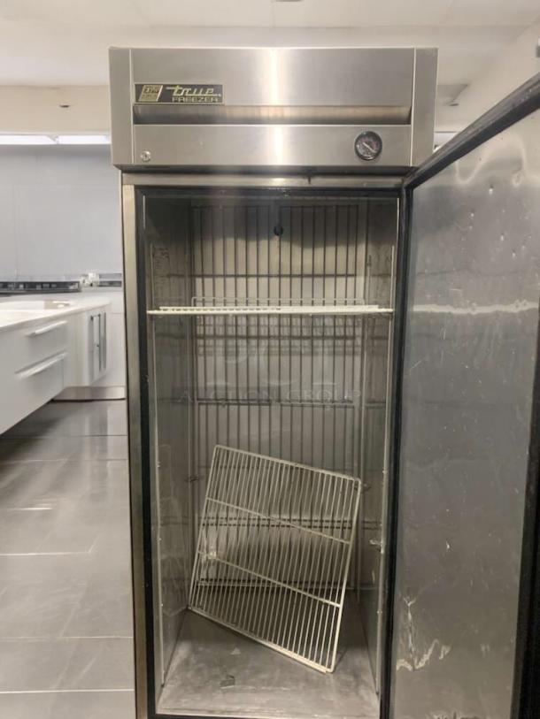 TRUE commercial upright freezer, single door, 115V, superior condition, fully tested, visible brand logo, open door view.