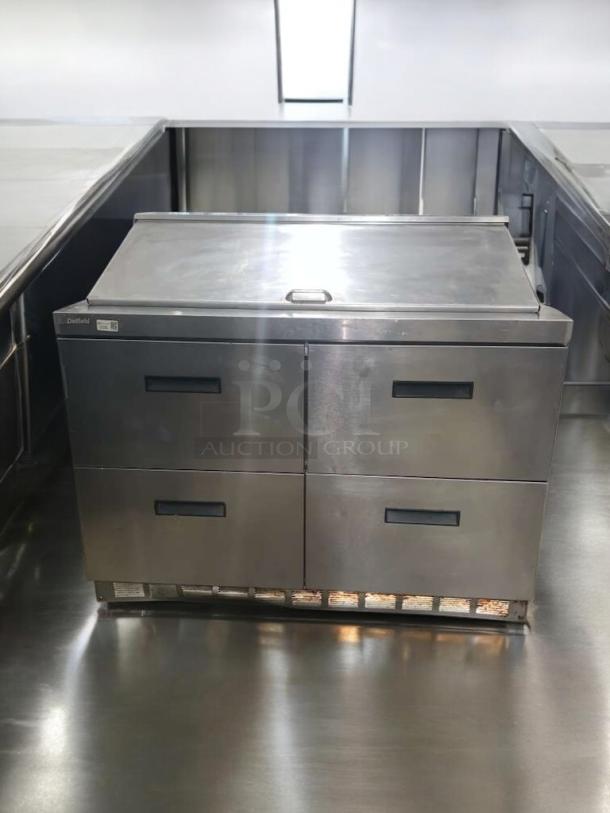 Prime condition Delfield D4448N-18M-A21 refrigerated prep table with double drawers, stainless steel, 115V, fully tested.
