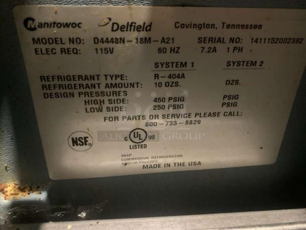 Manitowoc Delfield Refrigerated Prep Table label showing model D4448N-18M-A21, 115V, R-404A refrigerant. Made in USA.