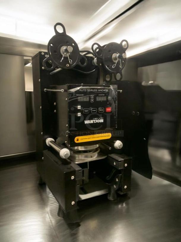 WantJoin WZ-95B automatic cup sealing machine, in optimal condition, 110–120V, fully tested and working.