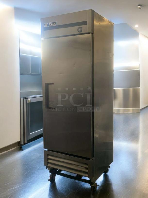 TRUE T-23F Single Door Commercial Freezer, excellent condition, 115V, fully tested. Robust design, visible brand label.
