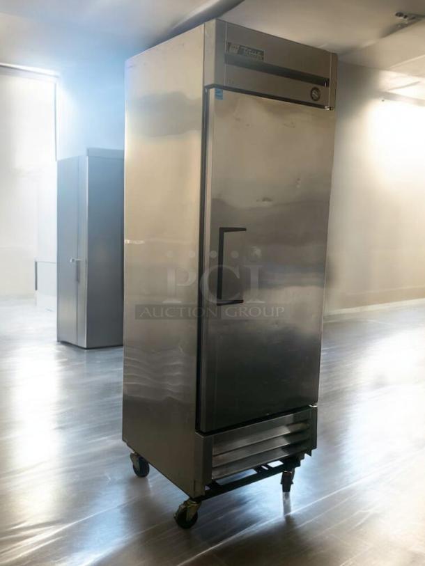 TRUE T-23F single door commercial freezer in superior condition, 115V, stainless steel, on casters, fully tested and working.