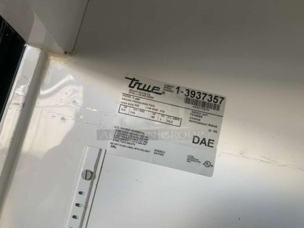 TRUE T-49F two-door commercial freezer label, showing model, voltage 115V, and refrigerant R404A. Fully tested, outstanding condition.