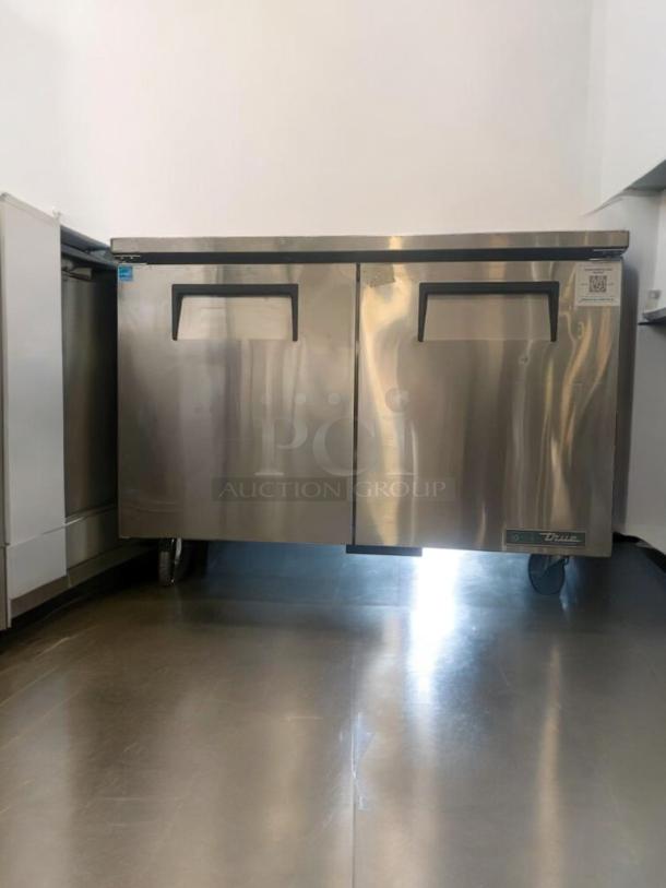 True TUC-48-HC undercounter refrigerator in immaculate condition, stainless steel, fully tested, 115V, two-door.