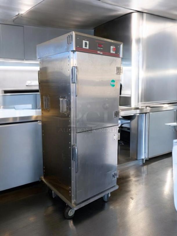 Bevles CA70-CV32SHW heated holding cabinet in prime condition, stainless steel, 120V, dual doors, on caster wheels, fully tested.