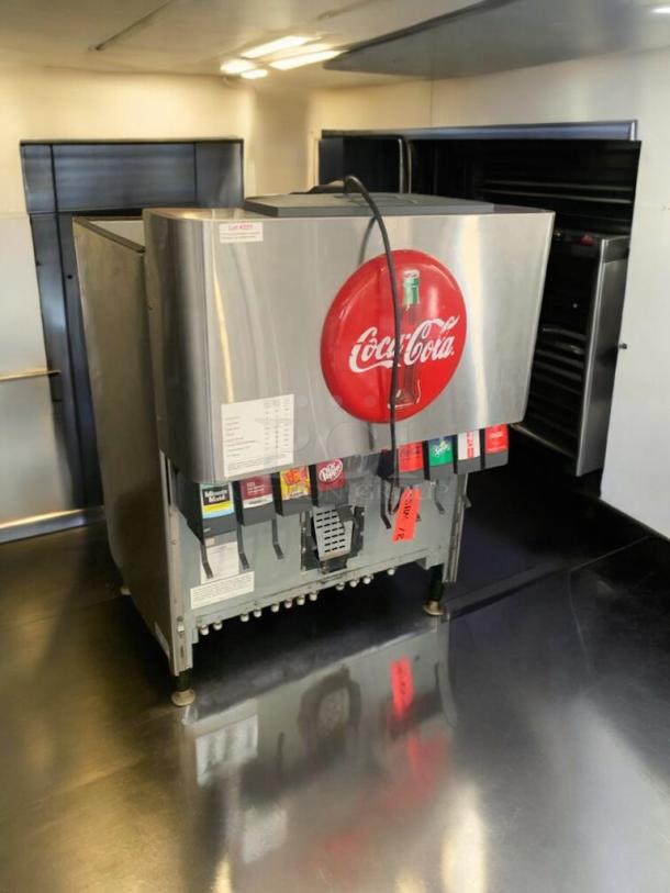 Lancer 4500 ice beverage dispenser, premium condition, fully tested, 115V, Coca-Cola branding, multiple drink options.