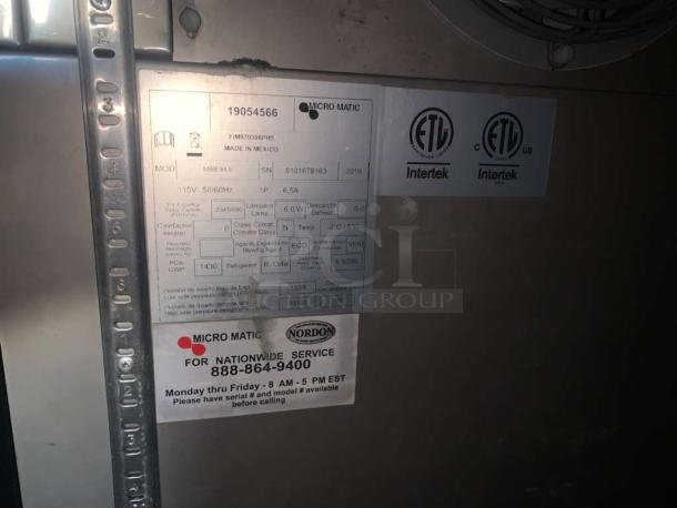 Micro Matic MBB94E commercial beer dispenser label, showing 115V power, ETL certification, and service contact details.