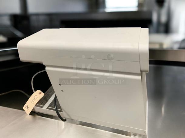 Commercial countertop hot/cold beverage dispenser in great condition. Fully tested and working, featuring a sleek, modern design.