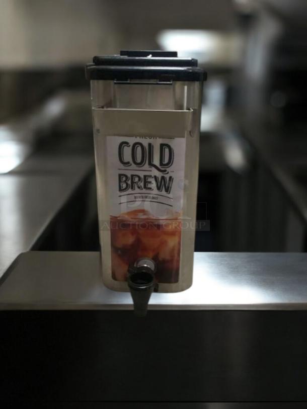 Newco Stainless Steel Cold Brew Dispenser in immaculate condition, featuring clear labeling and a functional tap, fully tested.