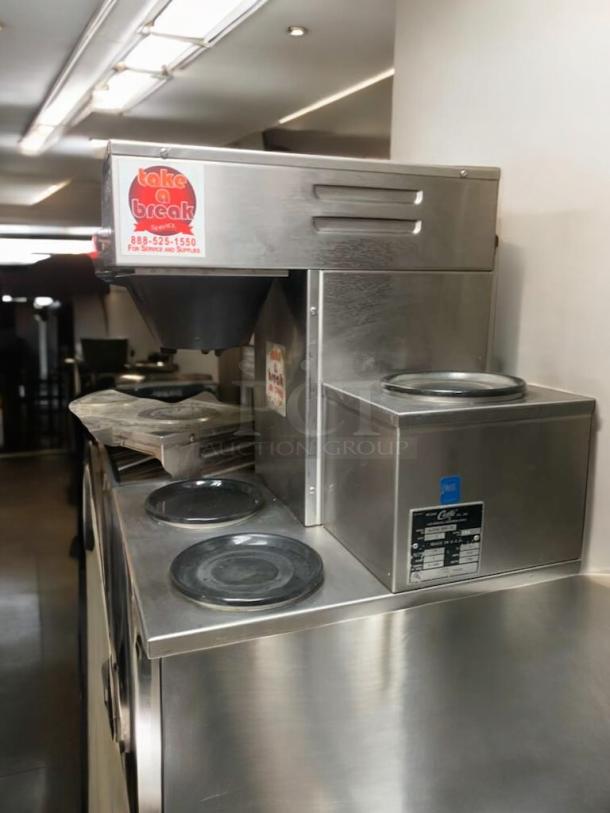 Gently used Curtis ALPHA 3DR-10 three-burner coffee brewer, stainless steel, 120V, commercial model, fully tested.