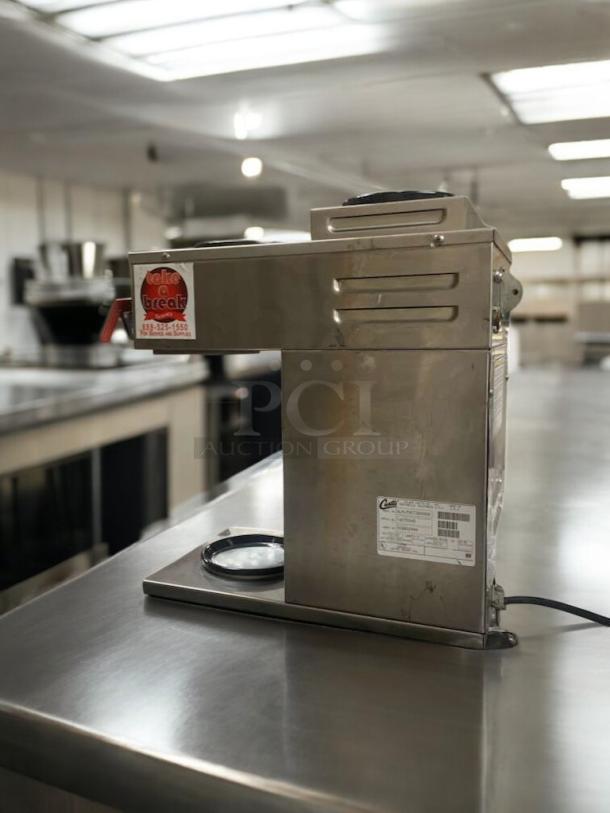 Wilbur Curtis SCALP3GT3A000 commercial coffee brewer on stainless steel counter, with visible model label. Prime condition.