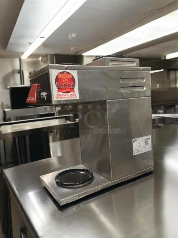 Wilbur Curtis SCALP3GT3A000 commercial coffee brewer, prime condition, stainless steel, 120/220V, label indicates service info.