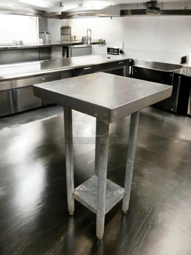 Heavy-duty stainless steel prep stand, great condition, sturdy legs, lower shelf, fully tested, commercial use.