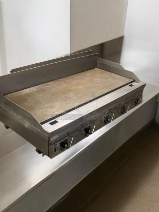 Commercial 6-burner flat top griddle, great condition, stainless steel, fully tested and working.