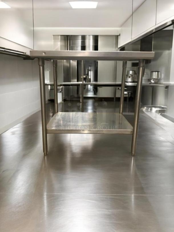 Stainless steel work table with undershelf in great condition, fully tested, unbranded commercial model.