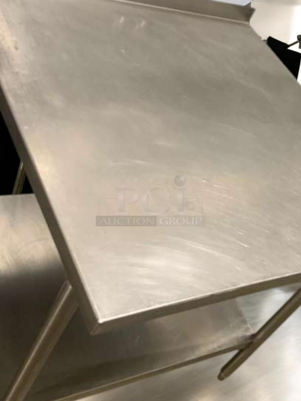 Stainless steel work table with undershelf in great condition, unbranded, fully tested, ready for use.