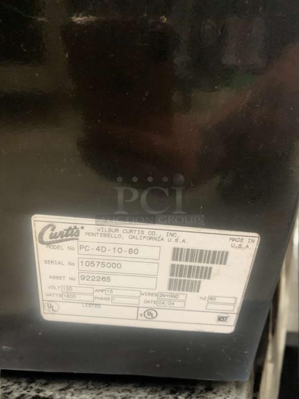 Wilbur Curtis PC-4D-10-80 cappuccino dispenser, pristine condition, model and specs label visible, 120V, fully tested.