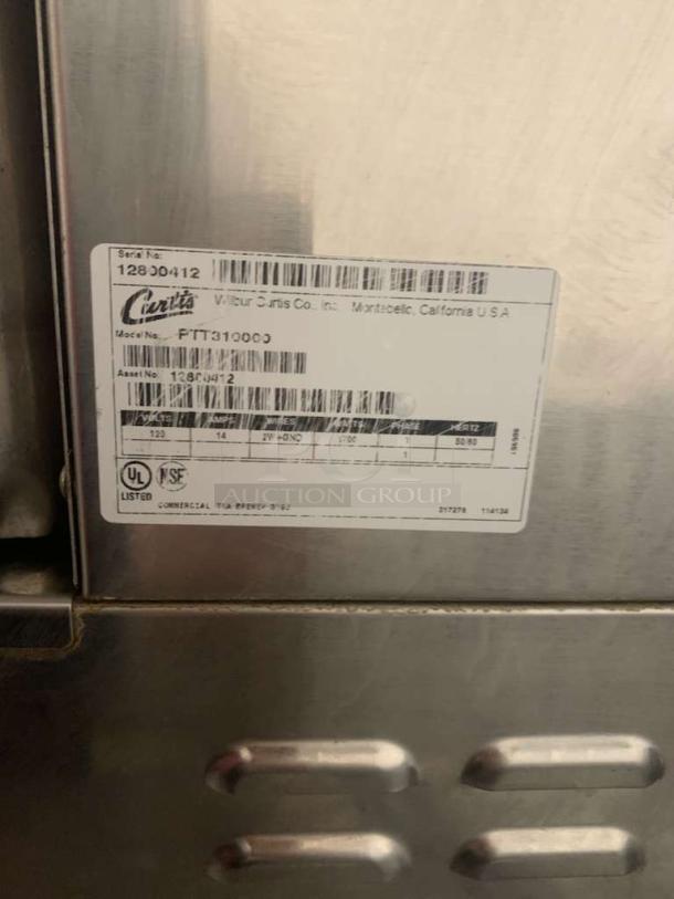 Wilbur Curtis FTT310000 iced tea brewer, exceptional condition, 120V, serial 12830412, UL and NSF listed, stainless steel.