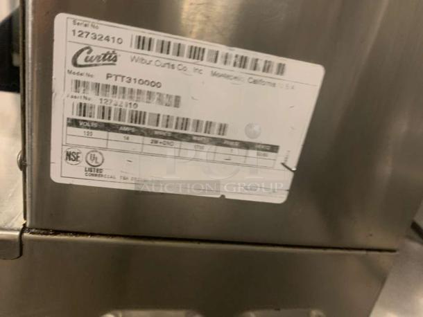 Prime condition Curtis PTT310000 commercial tea brewer, 120V. Fully tested, working. Visible label lists model and specs.