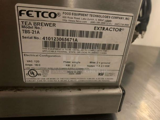 Fetco TBS-21A commercial tea brewer, 120V, in great working condition. Features include model and serial labels.