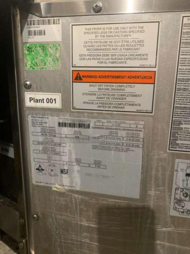 Pitco SG14T commercial gas fryer in great condition. Natural gas, fully tested and working. Labels show model and safety info.