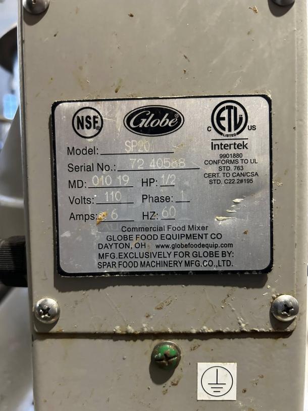Globe SP20 planetary mixer label showing model, serial number 72 40538, 0.5 HP, 110 volts, 3 speed. Dayton, OH, USA.