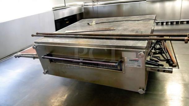 XLT 3255 natural gas conveyor pizza oven in exceptional condition, stainless steel exterior, fully tested, model label visible.