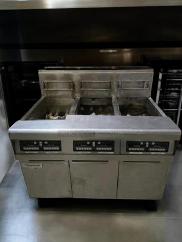 Frymaster HD50CS triple vat gas fryer, pristine condition, natural gas, fully tested, stainless steel finish, model tag visible.