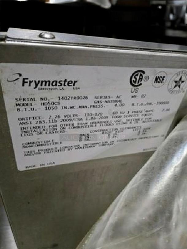 Label on Frymaster HD50CS triple vat gas fryer, showing model, BTU info, certifications, and made in USA. Pristine condition.