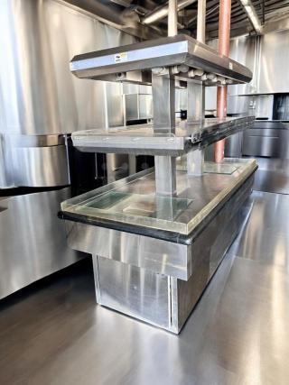 Royston 2HF-72-SS two-tier hot food island merchandiser, stainless steel, dual heat lamp, excellent condition, fully tested.