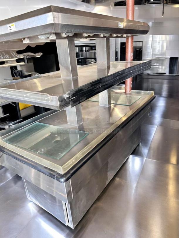 Royston 2HF-72-SS two-tier hot food island merchandiser, stainless steel, dual heat lamps, excellent condition.