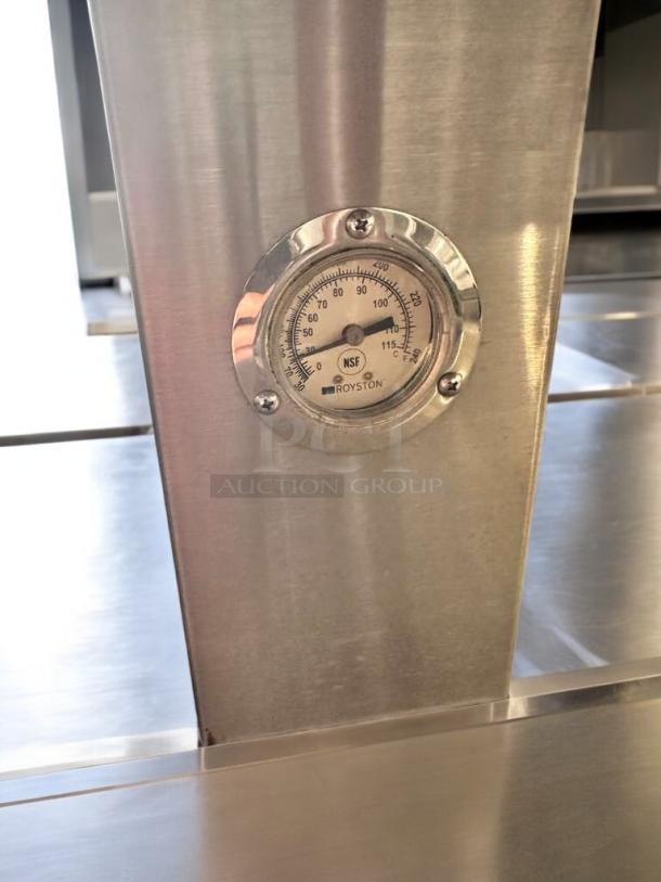 Royston 2HF-72-SS two-tier hot food island merchandiser, stainless steel, dual heat lamp, temperature gauge visible, excellent condition.