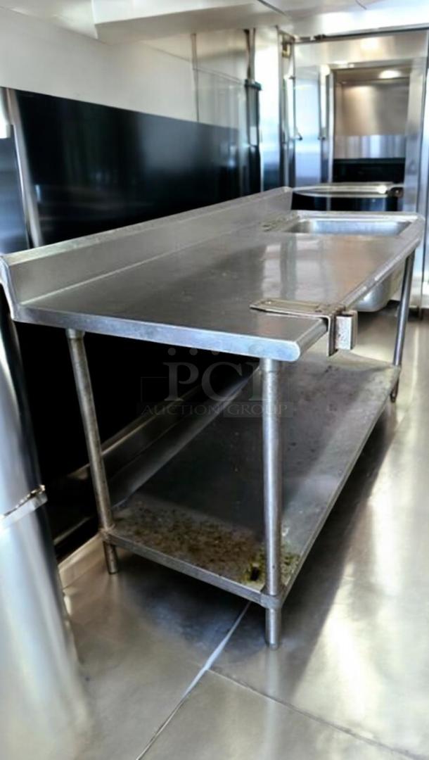 Stainless steel work table, 72"x30"x40", with integrated sink and can opener mount. Excellent condition, clean. Custom Commercial Fabrication model.