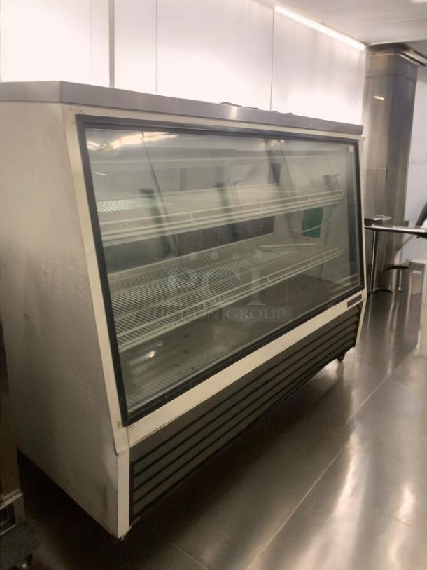 True GDM-72-2 refrigerated display with three glass doors, top-tier condition, 115V, fully tested, by True Manufacturing.