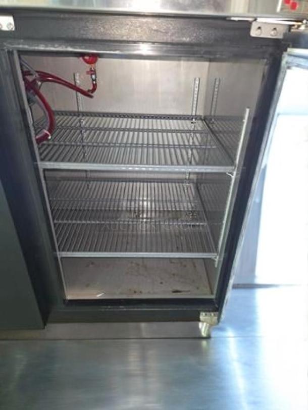 Micro Matic MBB-94-E refrigerated back bar cabinet, interior view with open door showing wire shelves, excellent condition.