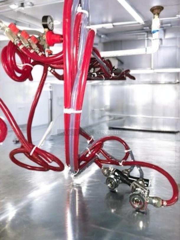 Micro Matic MBB-94-E back bar cabinet interior, showing red tube connections and fittings, in excellent condition.