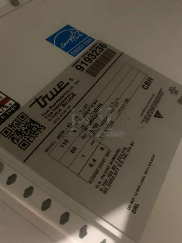 True GDM-23-HC~TSL01 label showing model, voltage (115V), and energy efficiency details. Pristine condition.