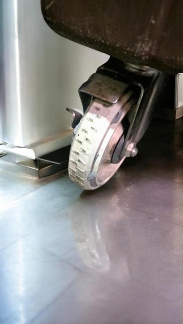 Cambro 6" Dish Caddy caster wheel, heavy-duty mobile plate cart, top-tier condition, tested and working, Cambro Manufacturing Co.