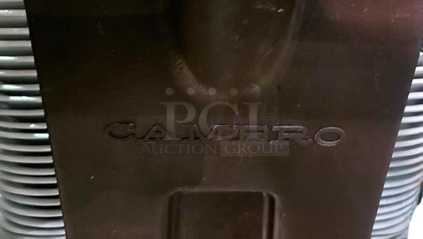 Cambro 6" Dish Caddy in top-tier condition, featuring a sturdy design with visible "CAMBRO" branding. Ideal for mobile dish storage.