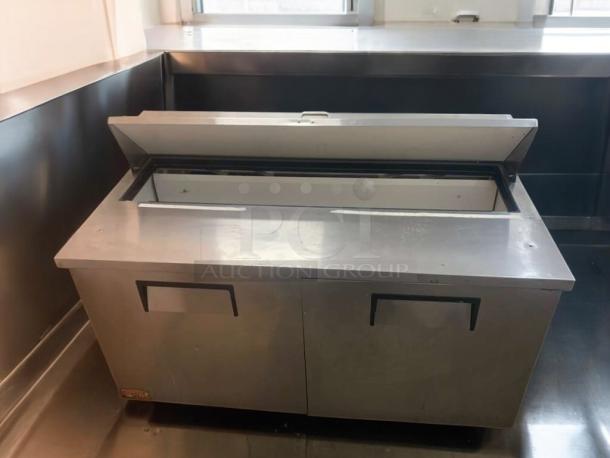 True TSSU-60-16 sandwich/salad prep table in prime condition, stainless steel, fully tested and working, dual doors.