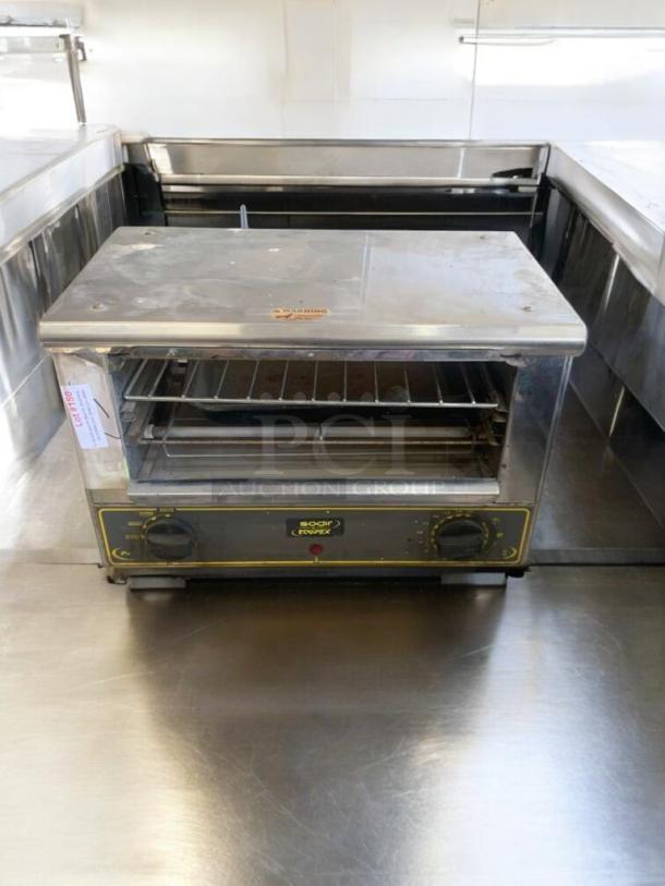 Equipex Sodir countertop electric oven, 120V, in great condition. Features manual controls, tested and fully functional.