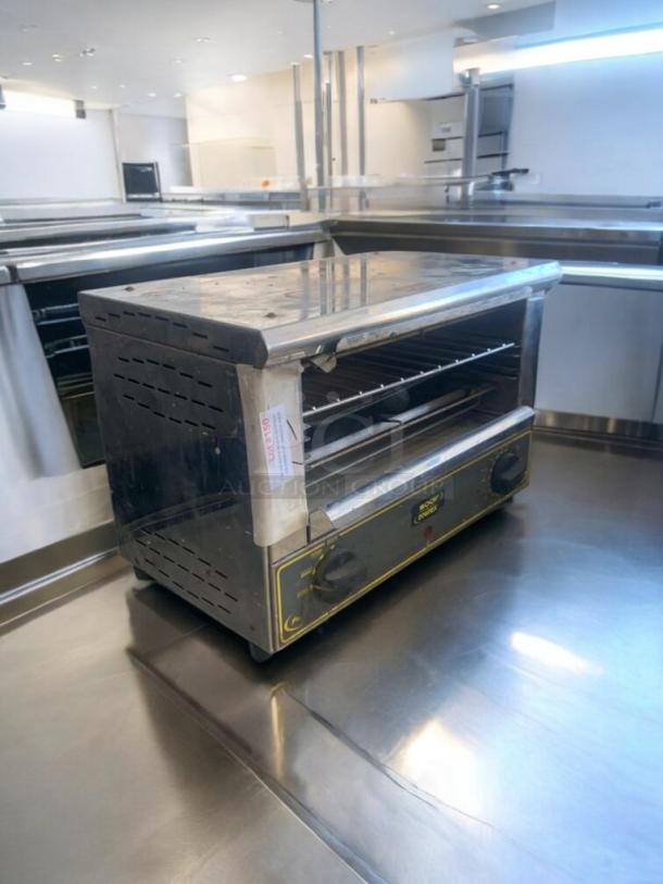 Equipex Sodir countertop electric oven, model 120V, in great condition. Features dual dials and ventilation slots.