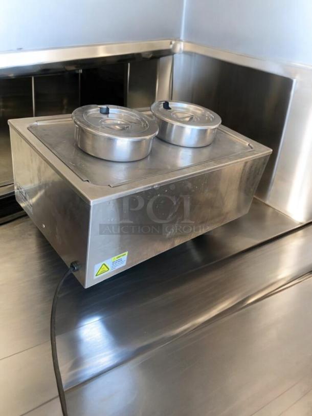 Winco food warmer with double round insets, 120V. Stainless steel, tested and working. Great condition.