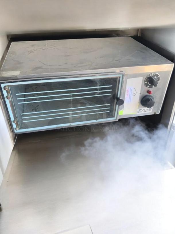 Wisco 616 Electric Countertop Oven, excellent condition, 120V, fully tested, Oregon, WI. Features timer, temperature dials.