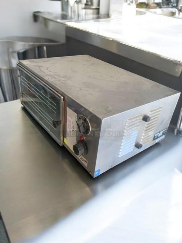 Wisco 616 Electric Countertop Oven, outstanding condition, 120V, fully tested, stainless steel exterior, labeled controls.