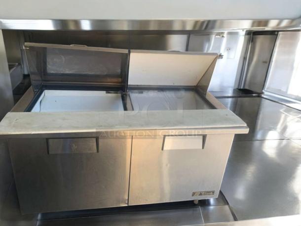 True TSSU-60-24M-B-ST refrigerated prep table in outstanding condition, dual compartments, stainless steel, fully tested.