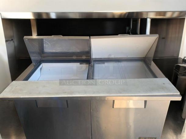 True TSSU-60-24M-B-ST refrigerated sandwich/salad prep table, stainless steel, outstanding condition, tested working.