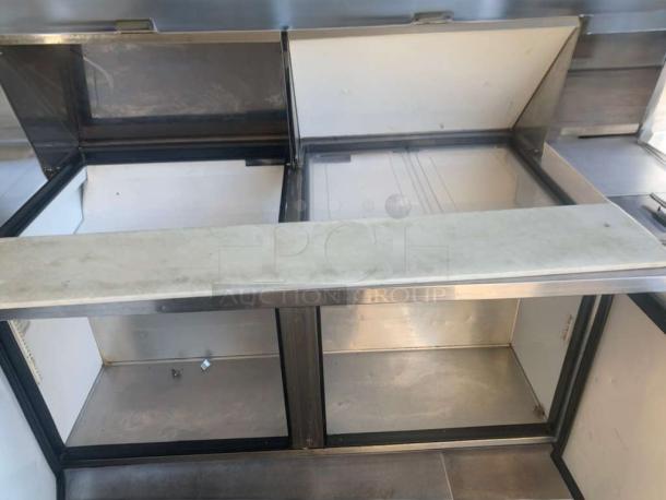 True TSSU-60-24M-B-ST refrigerated prep table in outstanding condition, 60", stainless steel, fully tested and working.